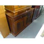 A DARK WOOD SMALL CABINET WITH TWO DRAWERS OVER TWO CUPBOARD DOORS