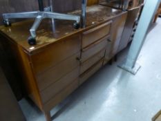 A MID TWENTIETH CENTURY OAK CUPBOARD OVER TWO DRAWERS AND THE MATCHING SMALL SIDEBOARD