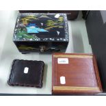 AN ORIENTAL BLACK LACQUER MUSICAL LADY'S TRINKET BOX, AN EASTERN HARDWOOD GAME BOX, AND A WOODEN