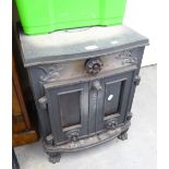 CAST IRON WOOD BURNER HAVING TWO GLAZED DOORS