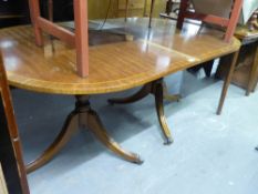 A REPRODUCTION MAHOGANY TWIN PILLAR DINING TABLE