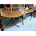 A REPRODUCTION MAHOGANY TWIN PILLAR DINING TABLE