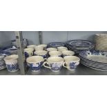 BLUE AND WHITE DINNER WARES 'WILLOW PATTERN', 66 PIECES AND SIX VICTORIAN BLUE AND WHITE SOUP