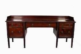 GEORGE III CARVED MAHOGANY INVERTED BREAKFRONT LARGE SIDEBOARD, the rope twist moulded shaped top