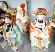 THREE MODERN CHINESE PORCELAIN IMMORTAL FIGURES