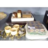 A BRASS 'WILLIAM AND MARY' TEAPOT STAND AND A QUANTITY OF TABLE MATS, NAPKIN RINGS ETC....