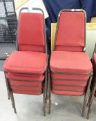 A SET OF 10 STACKING CHAIRS WITH RED FABRIC BACKS AND SEATS (10)