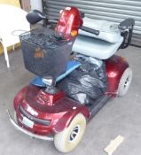 A FREERIDER FOUR WHEEL BATTERY DRIVEN MOBILITY SCOOTER (SOLD AS SEEN)