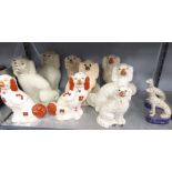 GROUP OF FOUR PAIRS OF STAFFORDSHIRE STYLE DOGS, A SMALLER PAIR OF DOG FIGURINES ON BLUE PLINTH