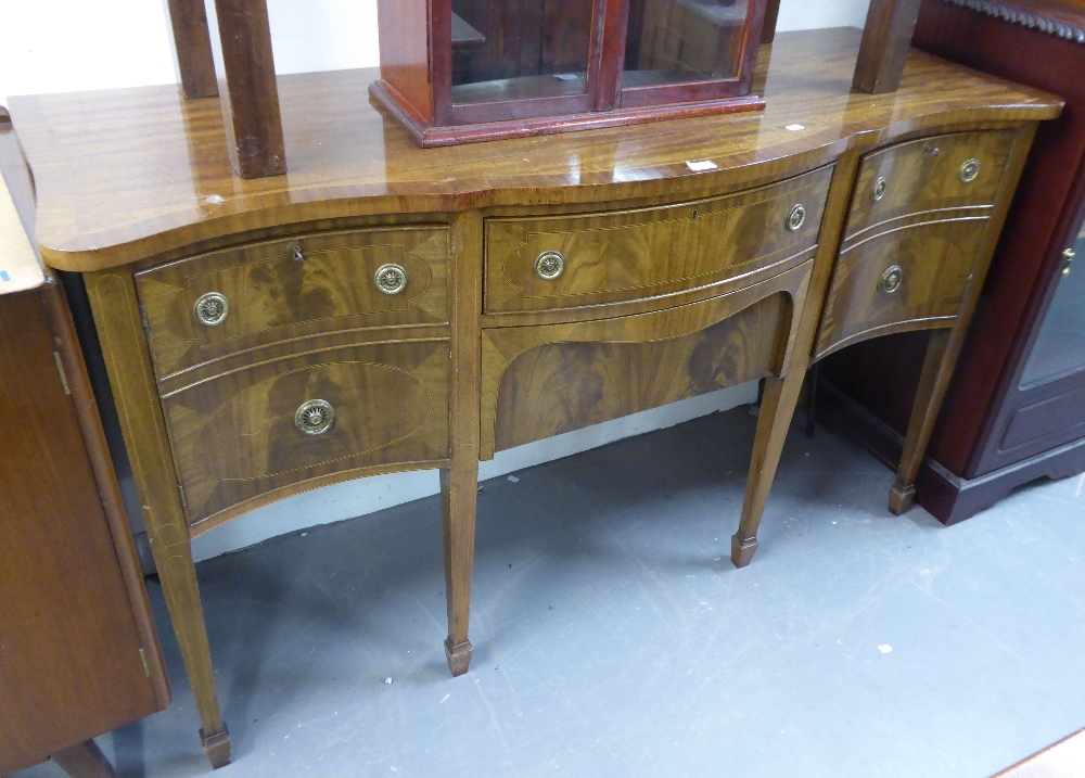 A REPRODUCTION SERPENTINE FRONTED CROSSBANDED AND BOXWOOD STUNG GEORGIAN STYLE SIDEBOARD