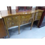 A REPRODUCTION SERPENTINE FRONTED CROSSBANDED AND BOXWOOD STUNG GEORGIAN STYLE SIDEBOARD