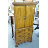 A REPRODUCTION WALNUT HI-FI CABINET AND A MATCHING TV CABINET (2)