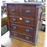 SMALL NARROW STAINED WOOD CHEST OF TWO SHORT AND 3 LONG DRAWERS AND A GLAZED TWO DOOR DISPLAY
