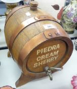 'PIEDRA CREAM SHERRY' OAK ADVERTISING SHERRY DISPENSER WITH COPPER BANDING, ON STAND