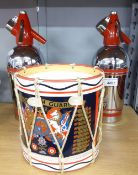 PAIR OF SPARKLETS SODA SYPHONS IN CHROME AND RED AND A COLDSTREAM GUARD TABLE DRUM (3)