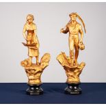 PAIR OF EARLY TWENTIETH CENTURY FRENCH GILT SPELTER FIGURES, 'L'AGRICULTURE', each on an ebonised