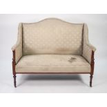 EDWARDIAN LINE INLAID MAHOGANY DRAWING ROOM TWO SEATER SETTEE, the arched top rail above downswept