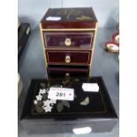A SMALL BLACK LACQUERED NEST OF THREE JEWELLERY DRAWERS AND A SIMILAR TRINKET BOX