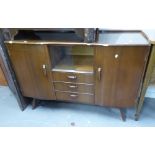 LANE, HIGH WYCOMBE, 1960's WALNUTWOOD SIDEBOARD AND DRAW LEAF DINING TABLE EN SUITE, ON SPLAYED