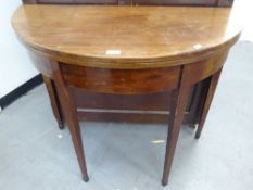 EARLY NINETEENTH CENTURY LINE INLAID MAHOGANY DEMI-LUNE FOLD OVER TEA TABLE, raised on square,