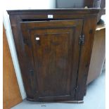 VICTORIAN OAK CORNER CUPBOARD HAVING SOLID PANEL DOOR ENCLOSED THREE SHAPED SHELVES