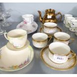 A SET OF FOUR ROYAL DOULTON FINE CHINA TEA CUPS AND SAUCERS; A CROWN DEVON 1930's TEA CUP AND