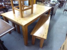 A LARGE PINE EXTENDING DINING TABLE, WITH TWO BENCH SEATS AND A SIMILAR DINING CHAIR (4)