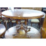 A LATE VICTORIAN SMALL OVAL WALNUTWOOD OCCASIONAL TABLE