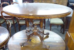 A LATE VICTORIAN SMALL OVAL WALNUTWOOD OCCASIONAL TABLE