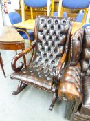MODERN REGENCY STYLE MAHOGANY ROCKING ARMCHAIR, BUTTON UPHOLSTERED IN BROWN HIDE
