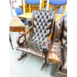 MODERN REGENCY STYLE MAHOGANY ROCKING ARMCHAIR, BUTTON UPHOLSTERED IN BROWN HIDE