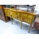 A REPRODUCTION SERPENTINE FRONTED CROSSBANDED AND BOXWOOD STUNG GEORGIAN STYLE SIDEBOARD