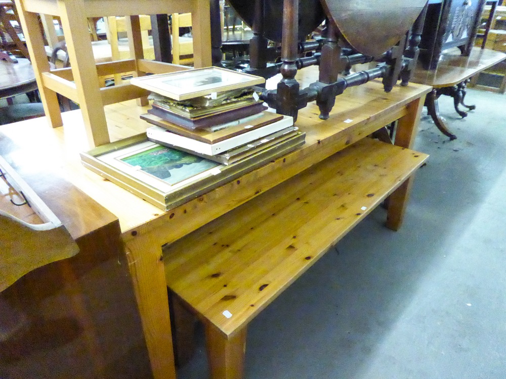 A LARGE PINE EXTENDING DINING TABLE, WITH TWO BENCH SEATS AND A SIMILAR DINING CHAIR (4)