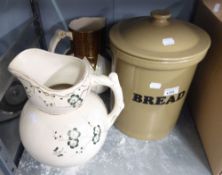 A LARGE POTTERY BREAD BIN AND COVER AND TWO LARGE TOILET JUGS