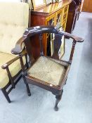 MAHOGANY CORNER ARMCHAIR WITH CANE SEAT