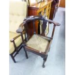 MAHOGANY CORNER ARMCHAIR WITH CANE SEAT