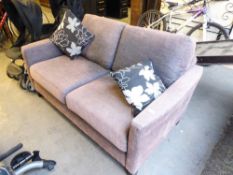'DFS' LINDA BARKER TWO SEATER SETTEE, COVERED IN BROWN FABRIC