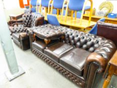 DARK BROWN HIDE, BUTTON UPHOLSTERED ROUND BACK CHESTERFIELD THREE SEATER SETTEE AND THE WINGED