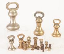 PROBABLY COMPOSITE SET OF SEVEN EARLY TWENTIETH CENTURY BRASS BELL WEIGHTS, to weigh from four