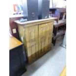 OAK CUPBOARD, HAVING TWO CUPBOARD PANEL DOORS, INTERNALLY WITH FOUR DRAWERS AND SHELVING, 42" (106.