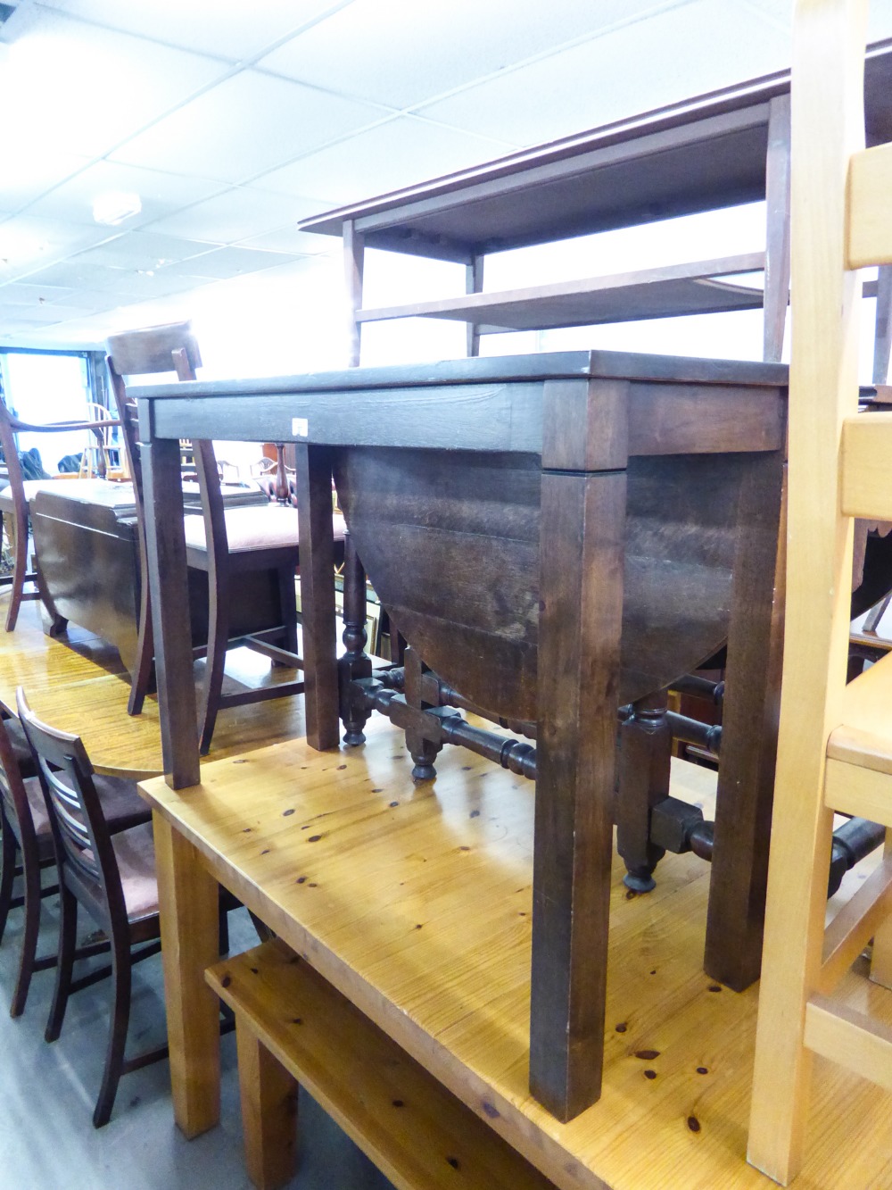 AN ORIENTAL EBONY NARROW OBLONG SIDE TABLE OR SMALL CUPBOARD WITH TWO GLAZED DOORS