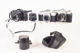 THREE 35mm SRL ROLL FILM CAMERAS, comprising: RICOH KR-5, with 55mm, f2.2 lens, and manual,