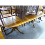 A REPRODUCTION MAHOGANY TWIN PILLAR DINING TABLE