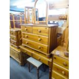 PINE TWO DRAWER DRESSING TABLE WITH TRIPLE FREE-STANDING MIRROR AND STOOL AND A PINE CHEST OF TWO