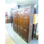 LARGE, TWO PANEL DOOR, STAINED WOOD STORAGE CUPBOARD, 71" (180.3cm) wide, 70" (177.8cm)high, 11 1/2"