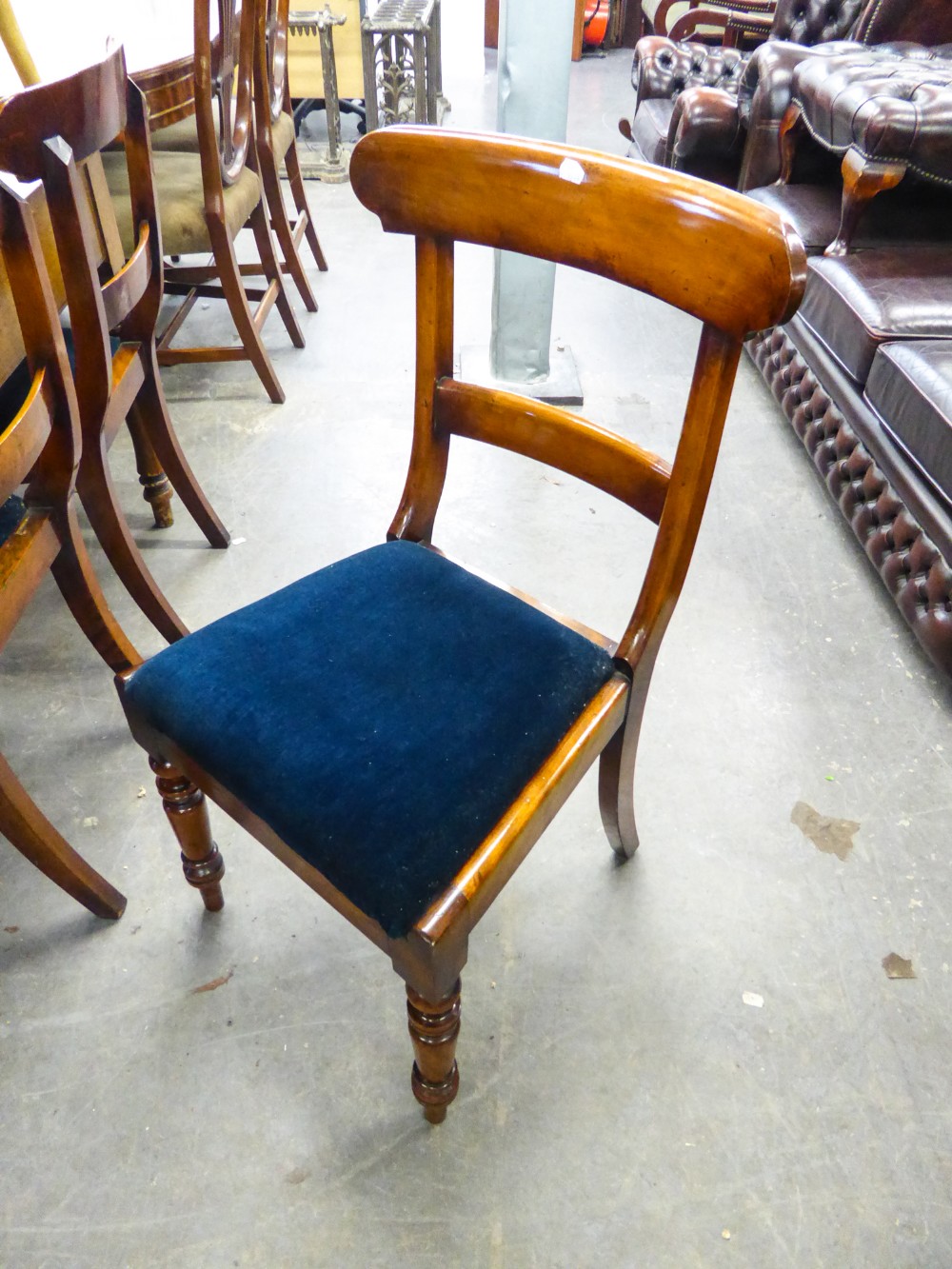 SET OF SIX MAHOGANY DINING CHAIRS HAVING SHAPED BACKS, TURNED FRONT LEGS AND DROP-IN SEATS