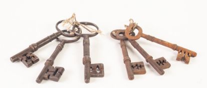 THREE VERY SIMILAR LARGE ANTIQUE STEEL KEYS each approx 5 1/2" (14cm) long, age patinated and