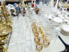 QUANTITY OF GLASSWARES TO INCLUDE; FOUR GLASS DECANTERS, VARIOUS DRINKING GLASSES ETC....