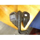 A LARGE AFRICAN CARVED EBONY ELEPHANTS HEAD WALL ORNAMENT (LACKS IVORY TUSKS) CIRCA 1930's