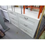 A PAIR OF WHITE MELAMINE THREE DRAWER CHESTS OF DRAWERS AND A PAIR OF WHITE FINISH BEDSIDE CHESTS OF